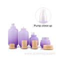 Matte purple glass bottles with wooden color cap